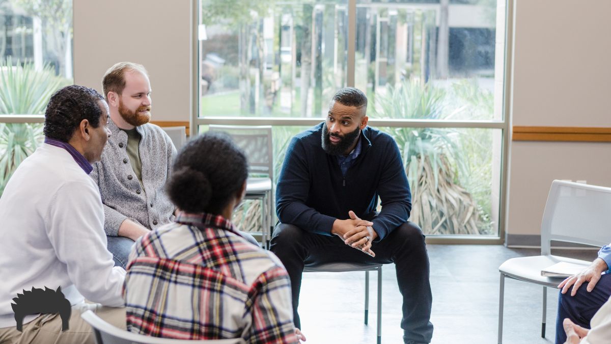 A group of men in a Coaching session. 