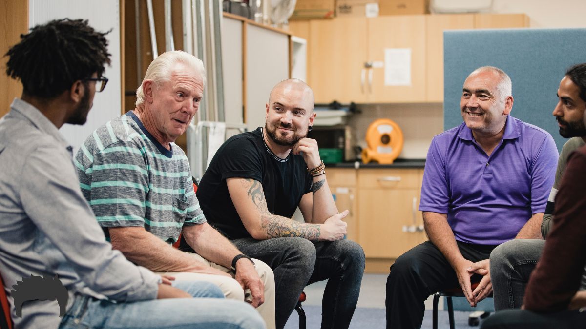 A group of men during life coaching. 