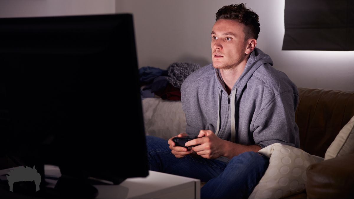 Man playing video games.