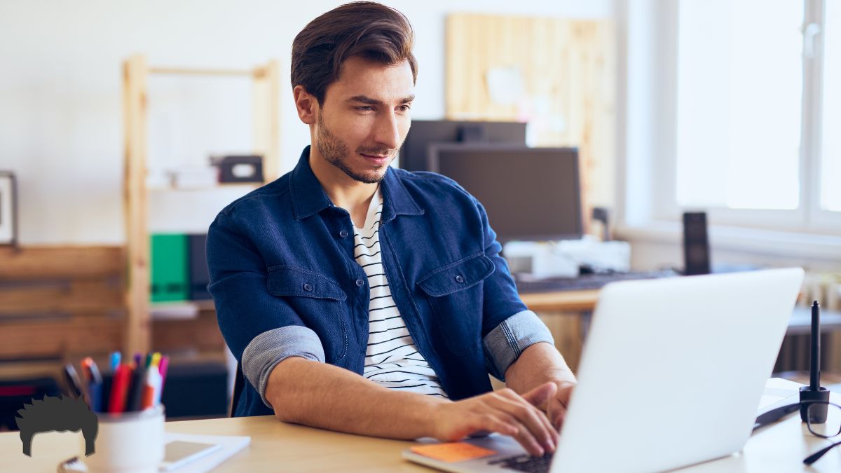 Man working on his laptop.